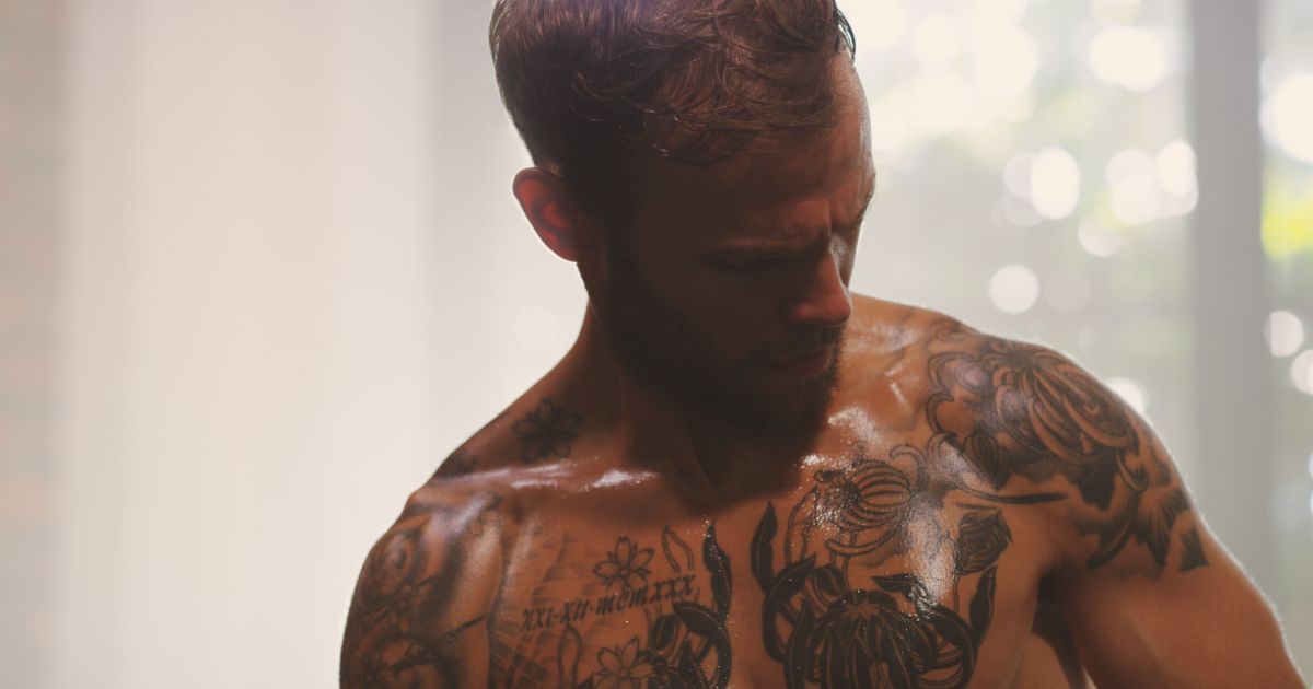 man sweating during workout