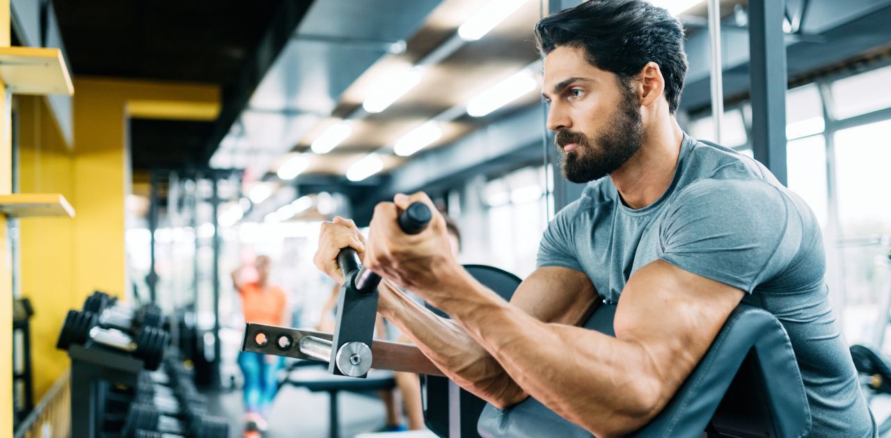 man doing bicep curls