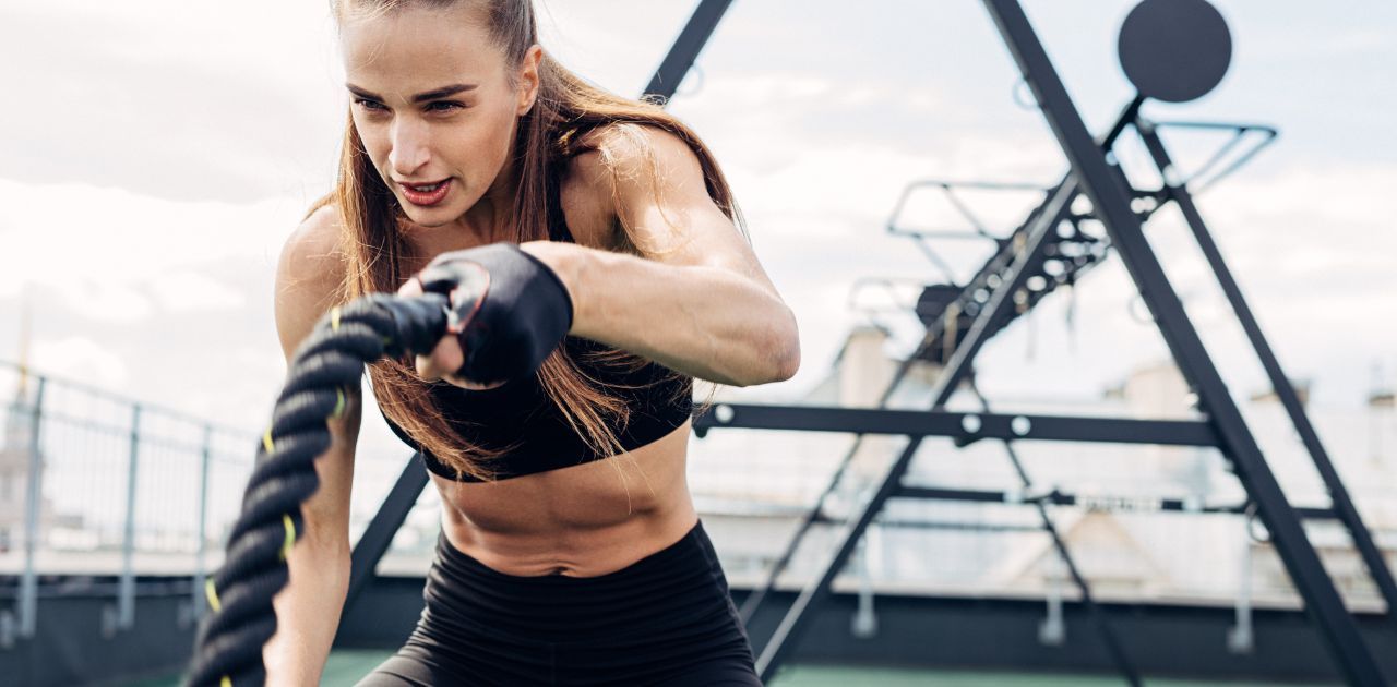 woman working out with ropes