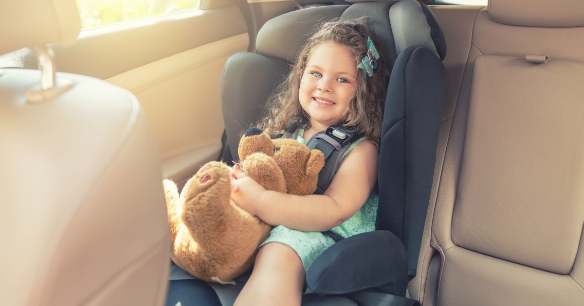 baby girl in car seat