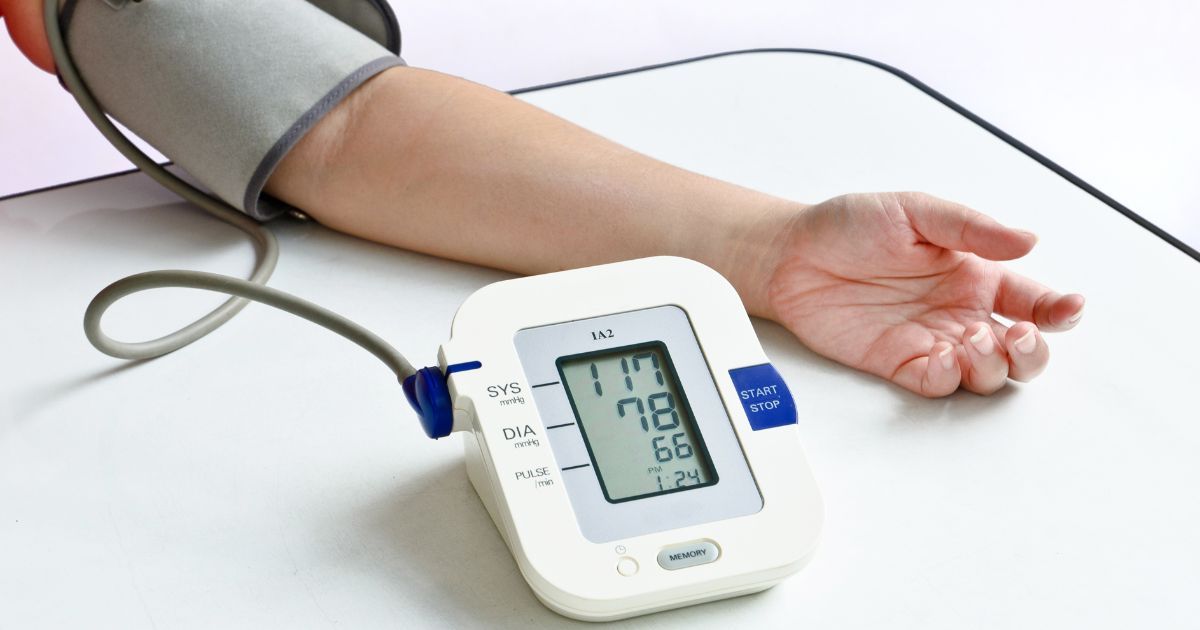 person taking their blood pressure