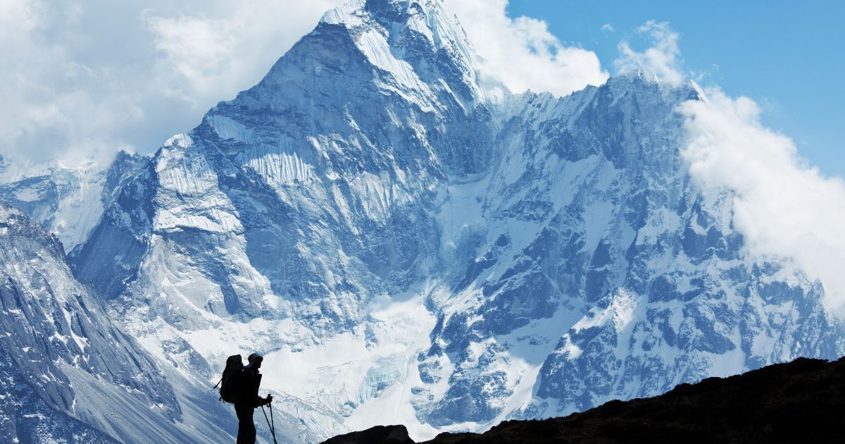 Hiking in Nepal with Mt Everest in the background