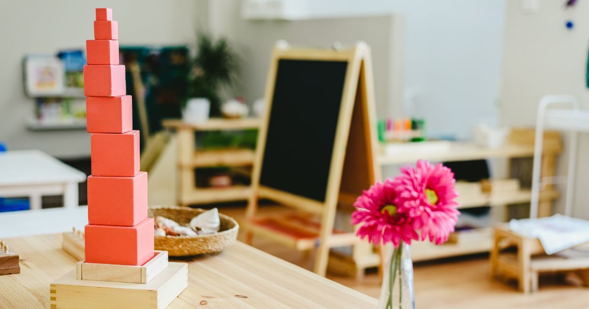 pink stacking blocks in a Montessori classroom