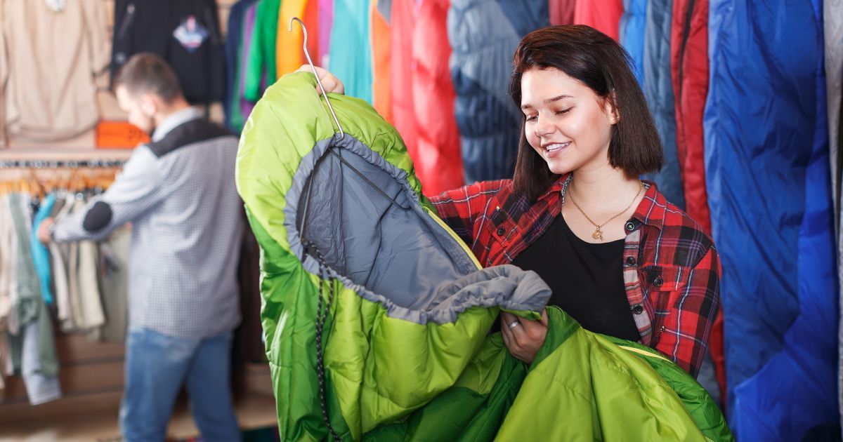 woman shopping for a sleeping bag