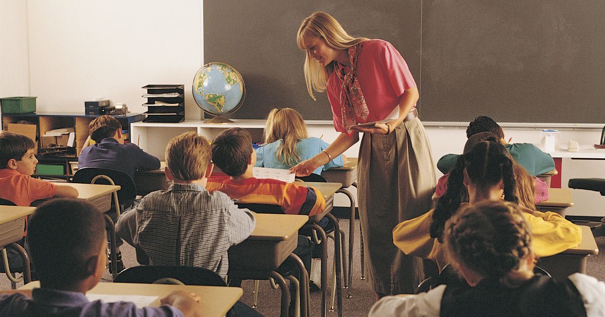 teacher walking around classroom
