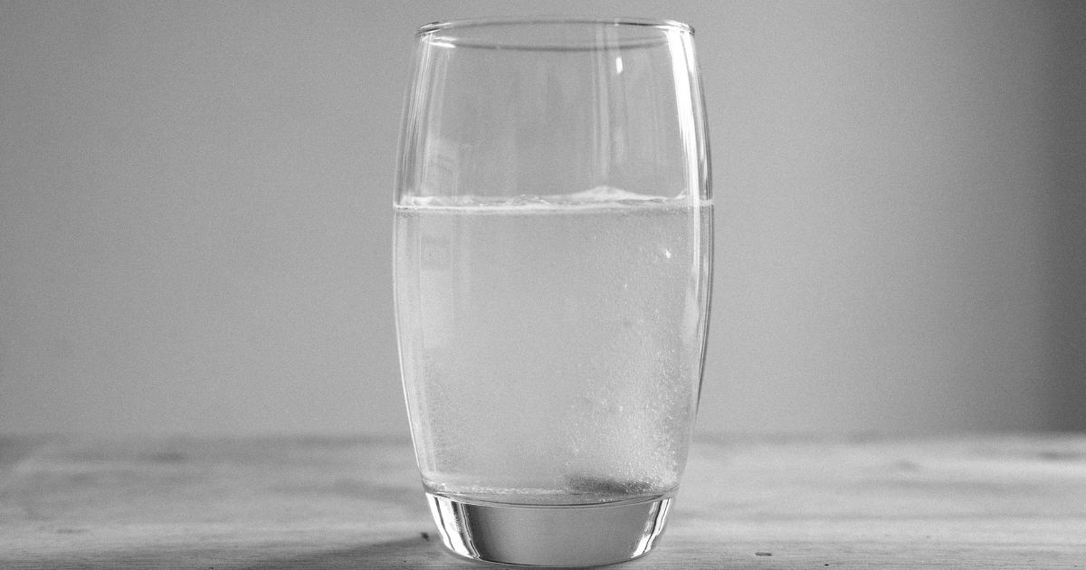 powder dissolving in water