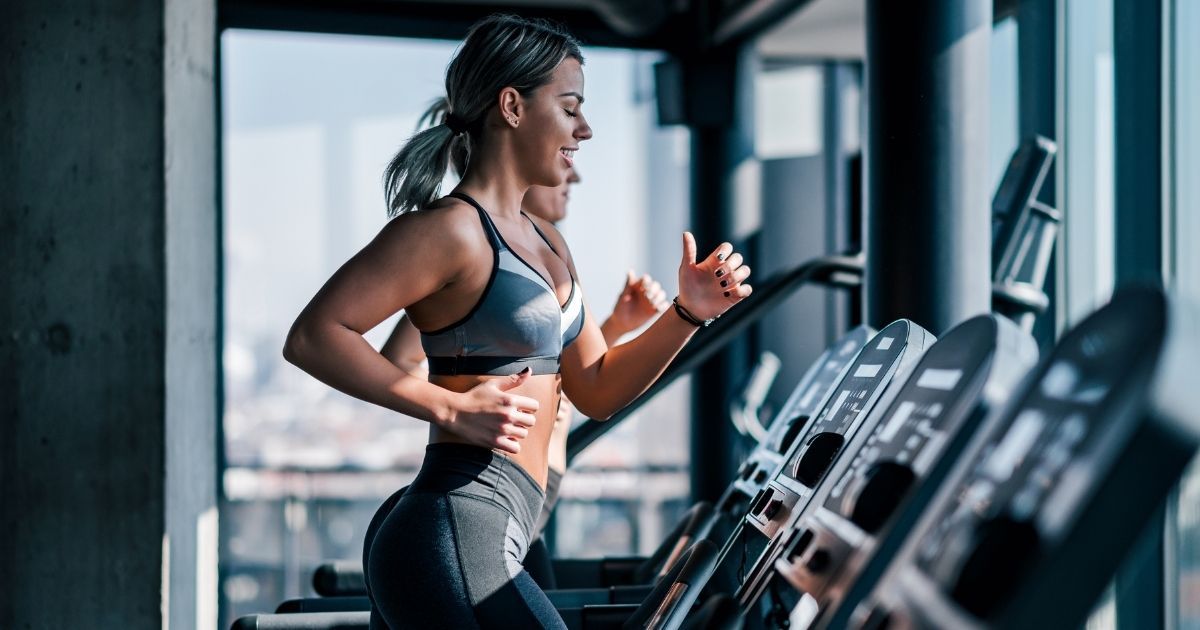 woman running on treadmill
