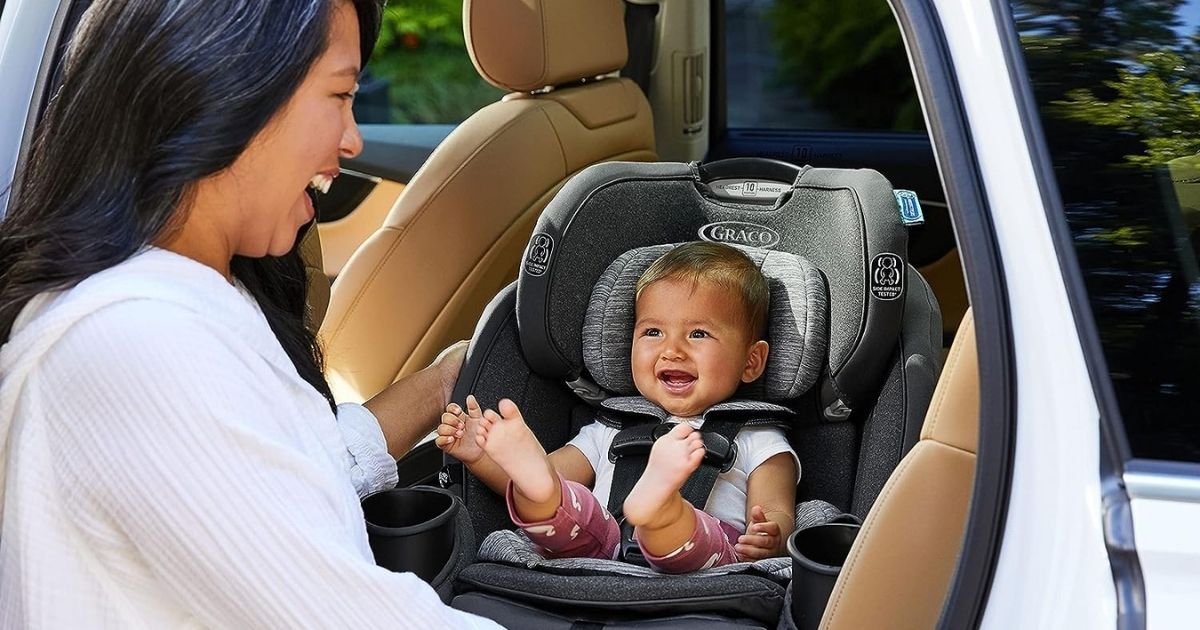 baby in a Graco Turn2Me car seat