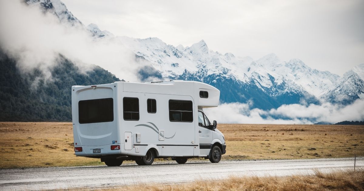 camper driving down road