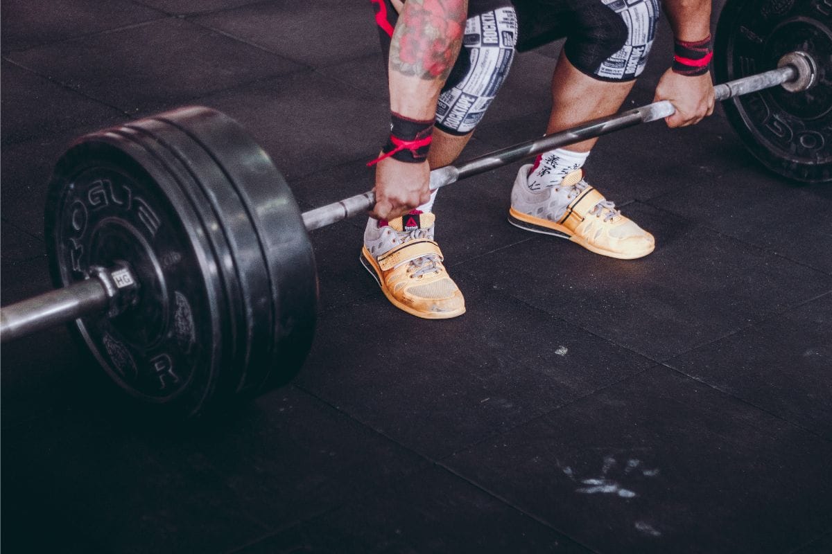 man deadlifting