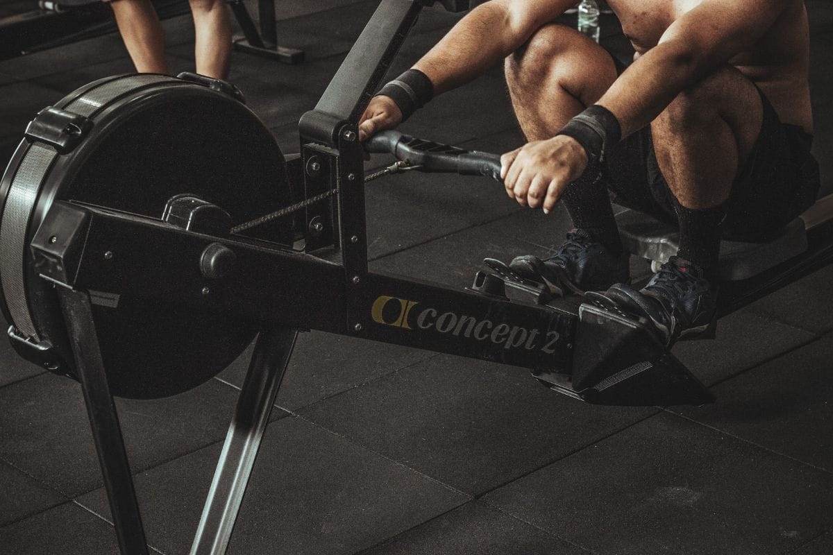 person on rowing machine